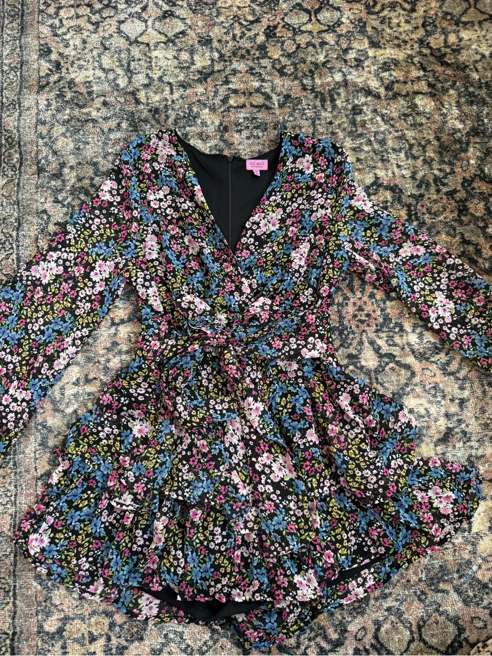 Francesca's Collections Black Floral Wrap Romper with Pink Blue Green Accents
